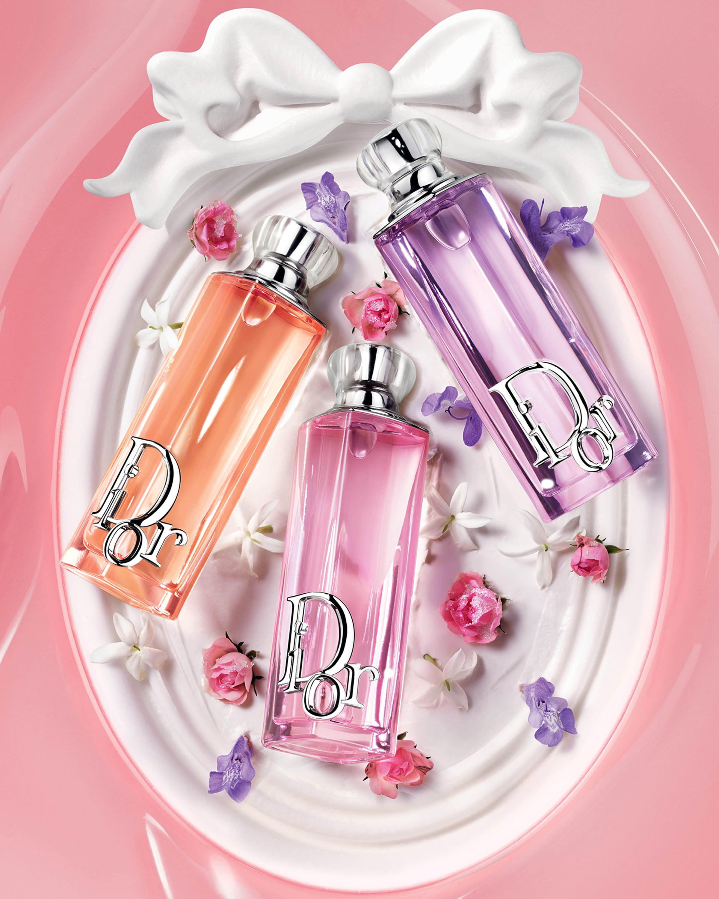Botellas de Eau De Parfum Dior Addict Rosy Glow, Peachy Glow y Purple Glow